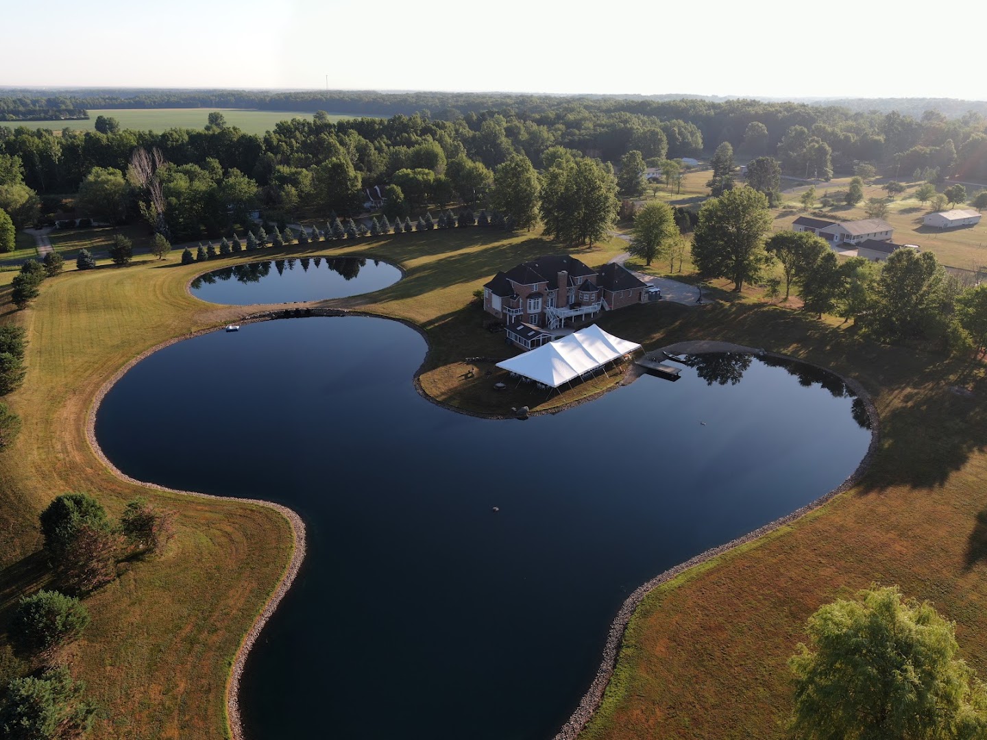 Aerial view of a private estate surrounded by interconnected lakes in Ohio